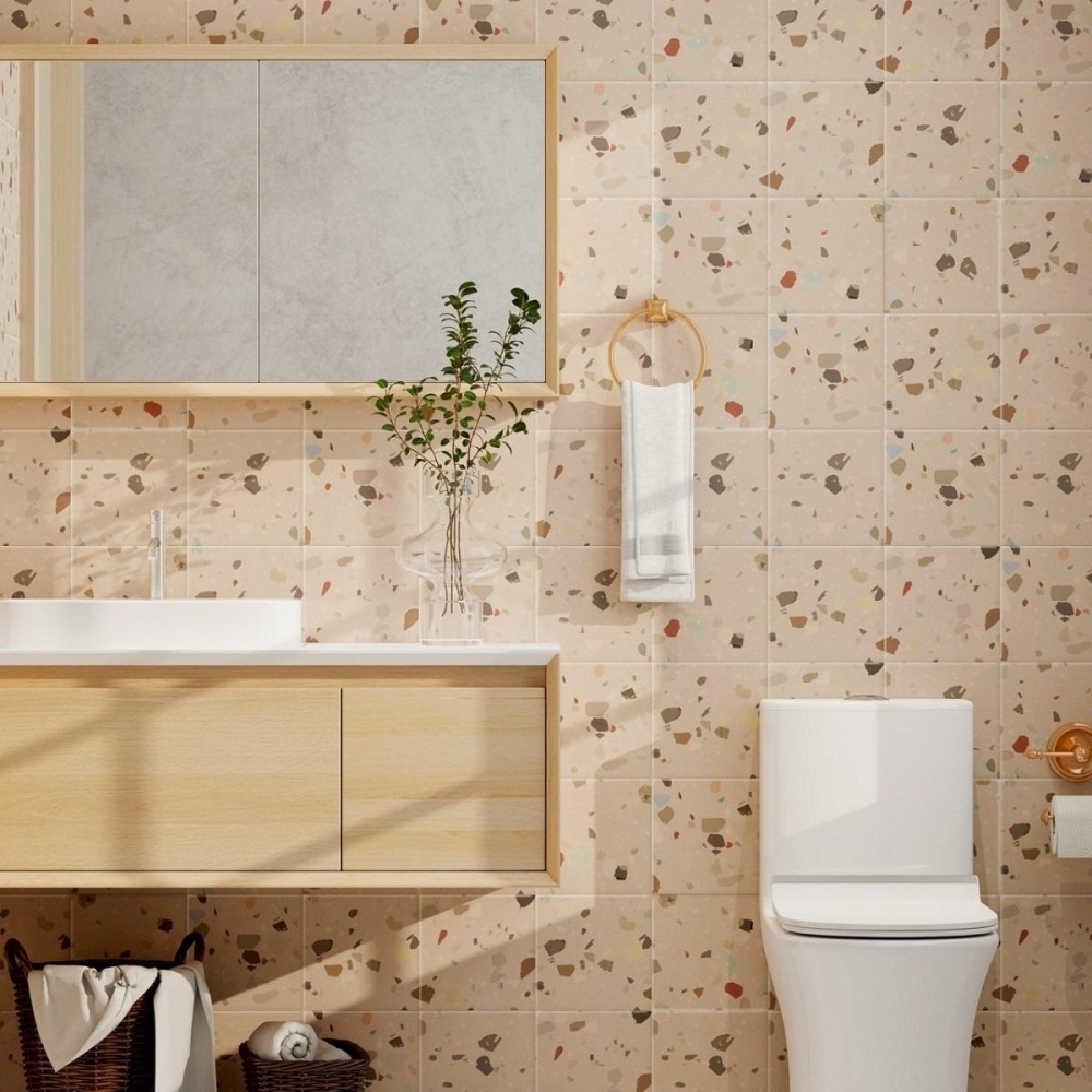 粉色水磨石磁磚牆面，打造溫暖浴室空間